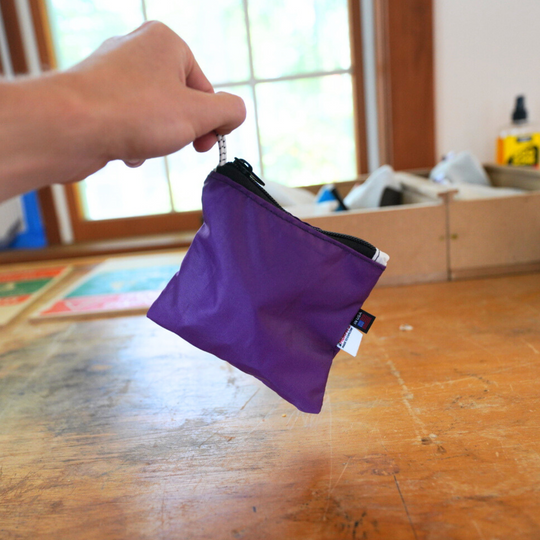 A small pouch made from upcycled sailboat sail - Purple